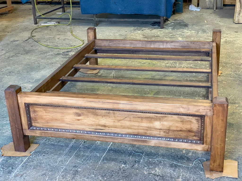 Handcrafted solid wood bed frame by Green Wood Milling Co.