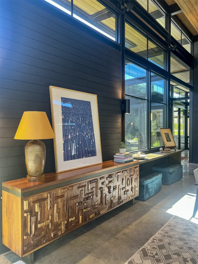 Custom wood credenza with carved panel doors by Green Wood Milling Co. in San Antonio TX
