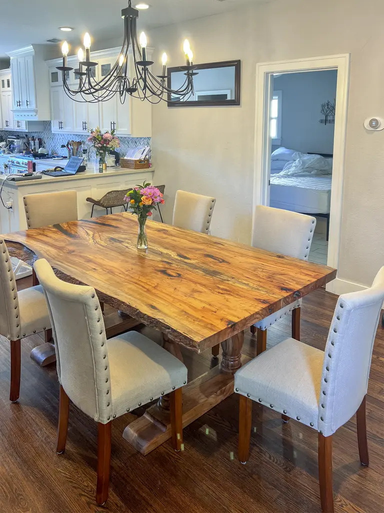 Live edge dining table in San Antonio home by Green Wood Milling Co.