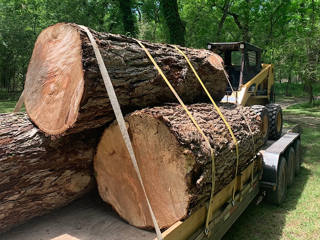 Log transport service for custom milling into lumber and slabs
