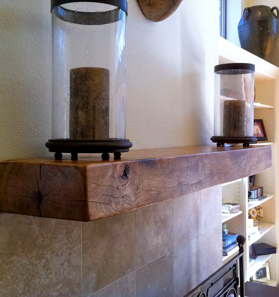 Live edge mantle with glass candle holders by Green Wood Milling Co.