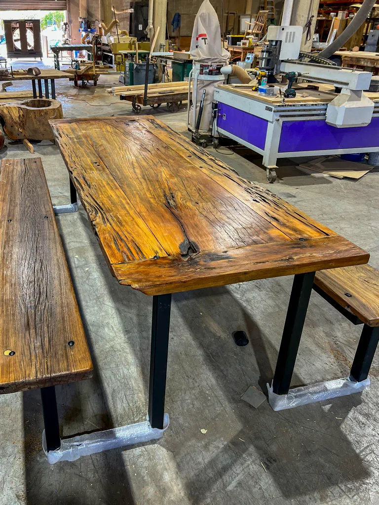 Reclaimed wood picnic table with metal legs by Green Wood Milling Co.