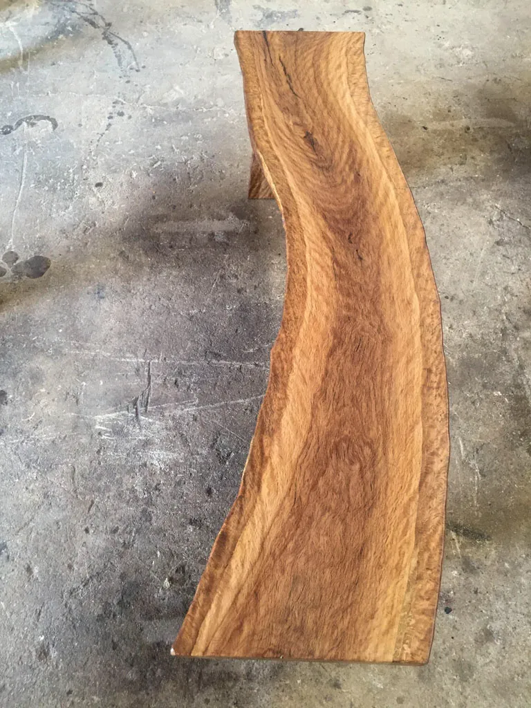 Waterfall edge solid wood bench for outdoor seating
