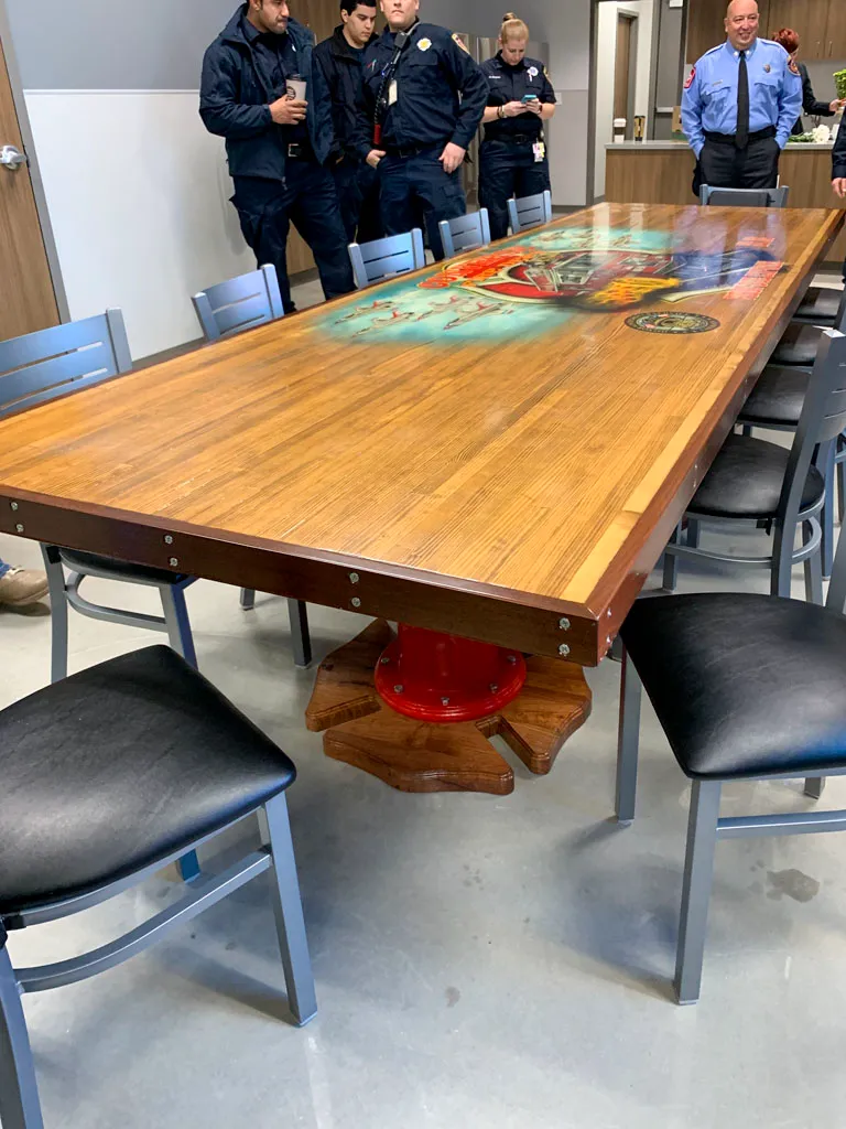 Fire department conference table with red hydrant base in San Antonio