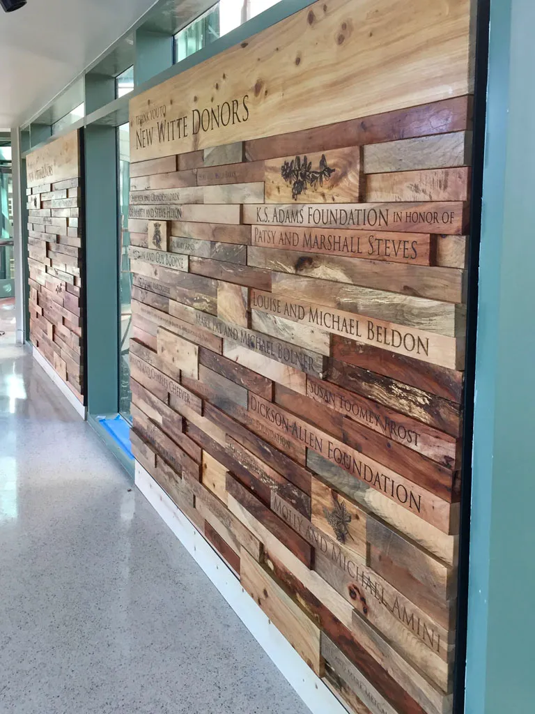 Engraved reclaimed wood donor wall at Witte Museum San Antonio
