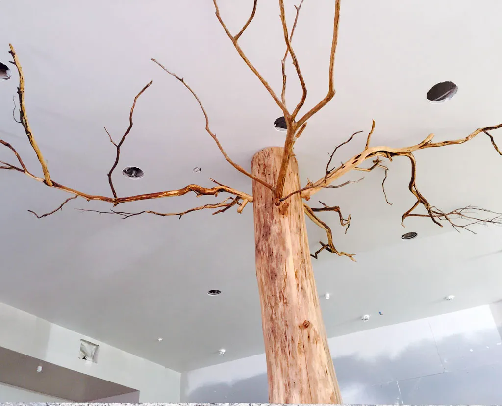Custom tree trunk column with branches in San Antonio
